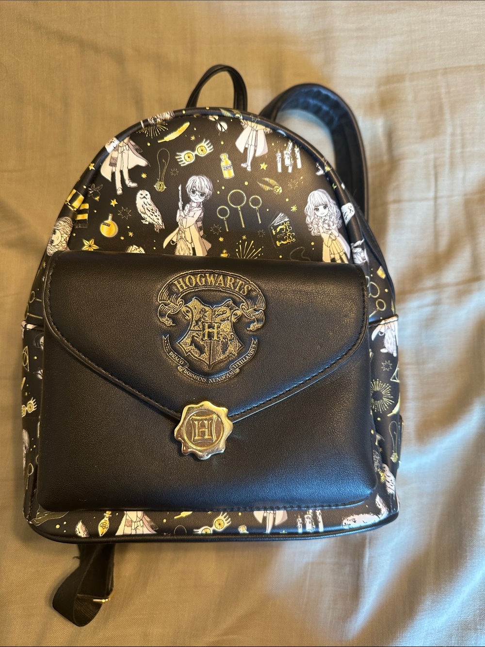 Loungefly Black & Gold Hogwarts Mini Backpack
